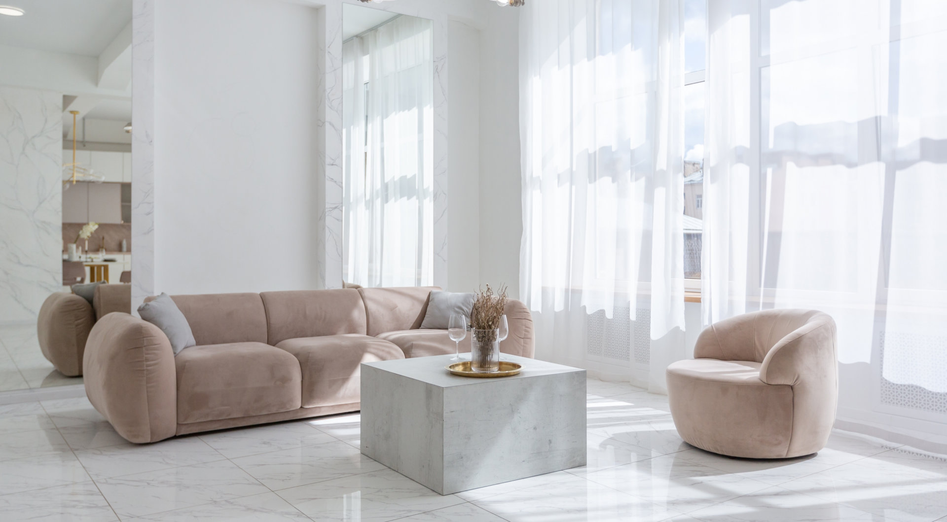 living room with soft beige furniture in a light luxury interior design