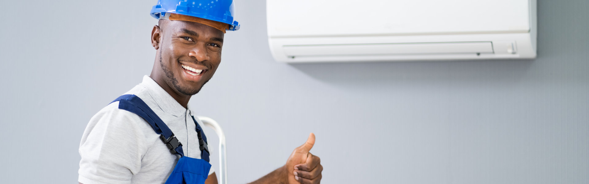 Repairman having a thumbs up